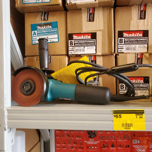 Makita 6 Amp Corded 4 in. Lightweight Angle Grinder with Grinding Wheel, Wheel Guard, Side Handle, Hard Case Open Box Makita
