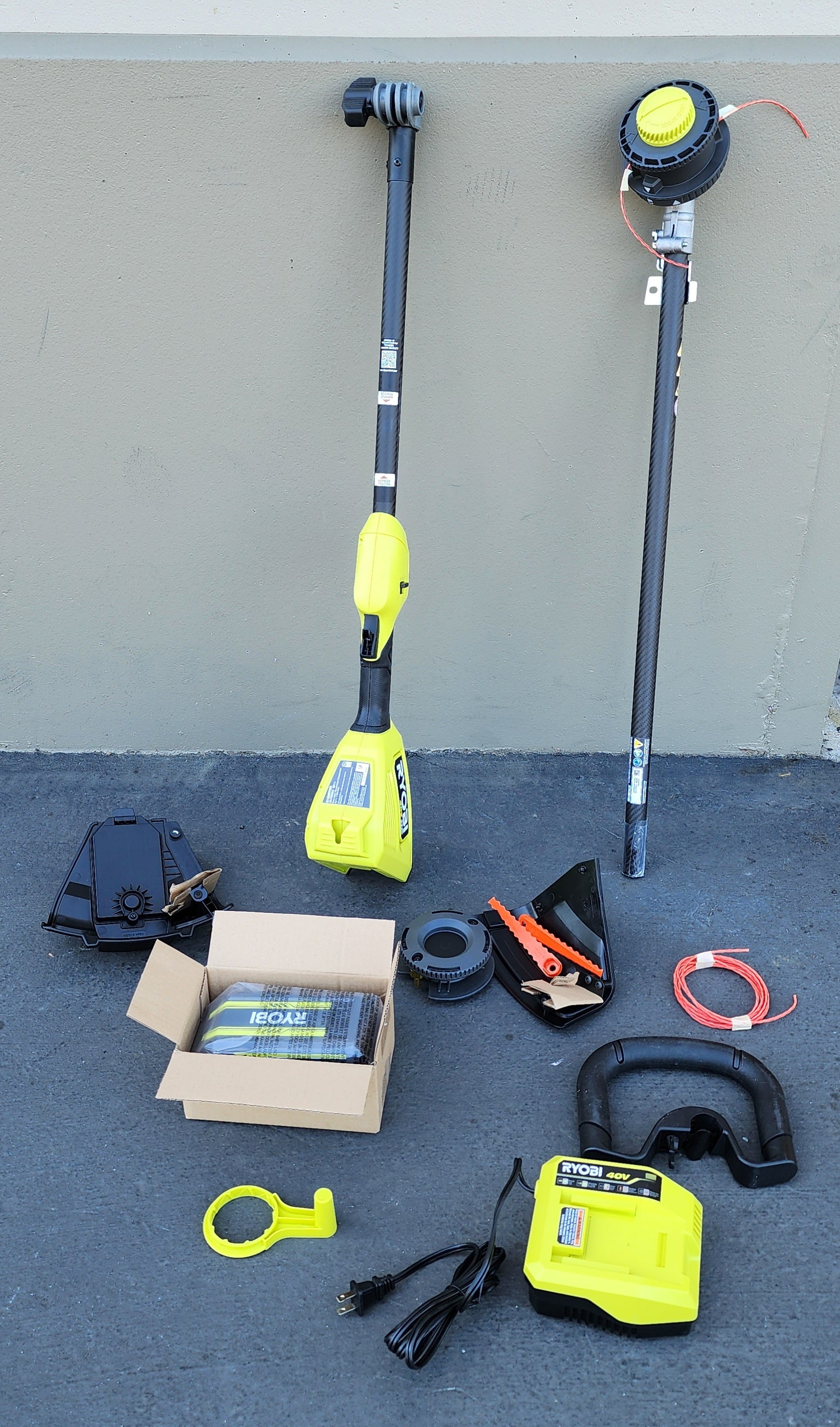 RYOBI 40V HP Brushless 16 in. Cordless Carbon Fiber Shaft Attachment Capable String Trimmer with 4.0 Ah Battery and Charger RYOBI