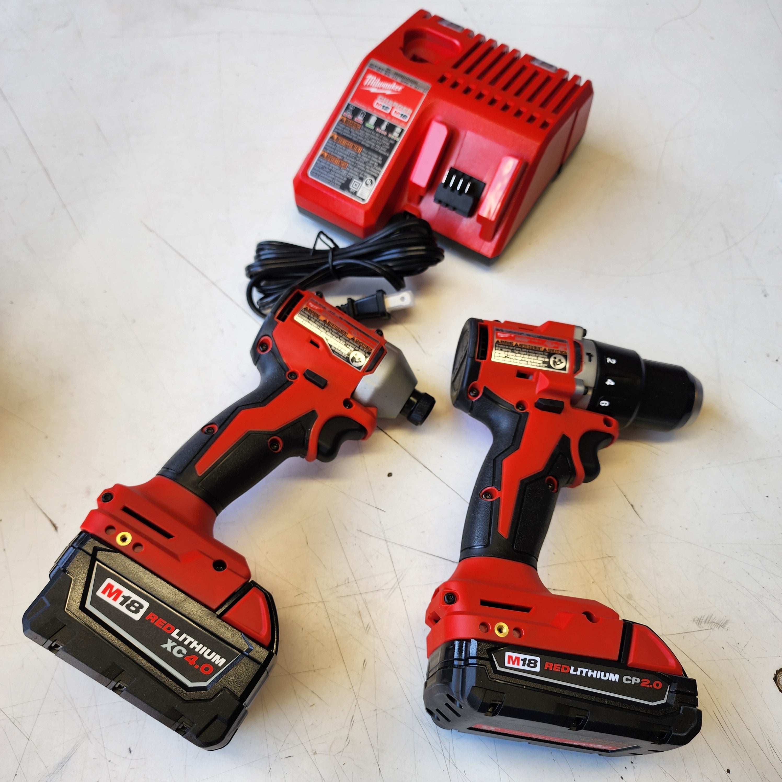 Milwaukee M18 18-Volt Lithium-Ion Brushless Cordless Compact Hammer Drill/Impact Combo Kit (2-Tool) with (2) Batteries, Bag