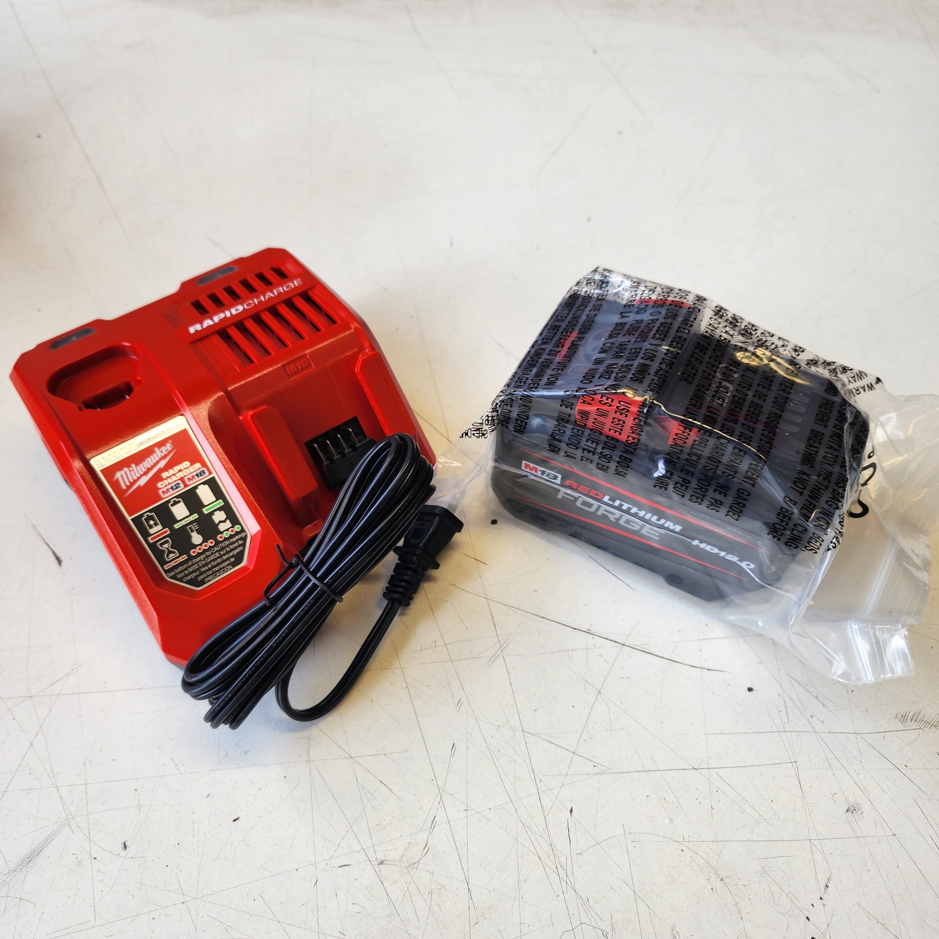 Milwaukee M18 18-Volt Lithium-Ion REDLITHIUM FORGE Starter Kit with 12.0Ah Battery and Charger Milwaukee