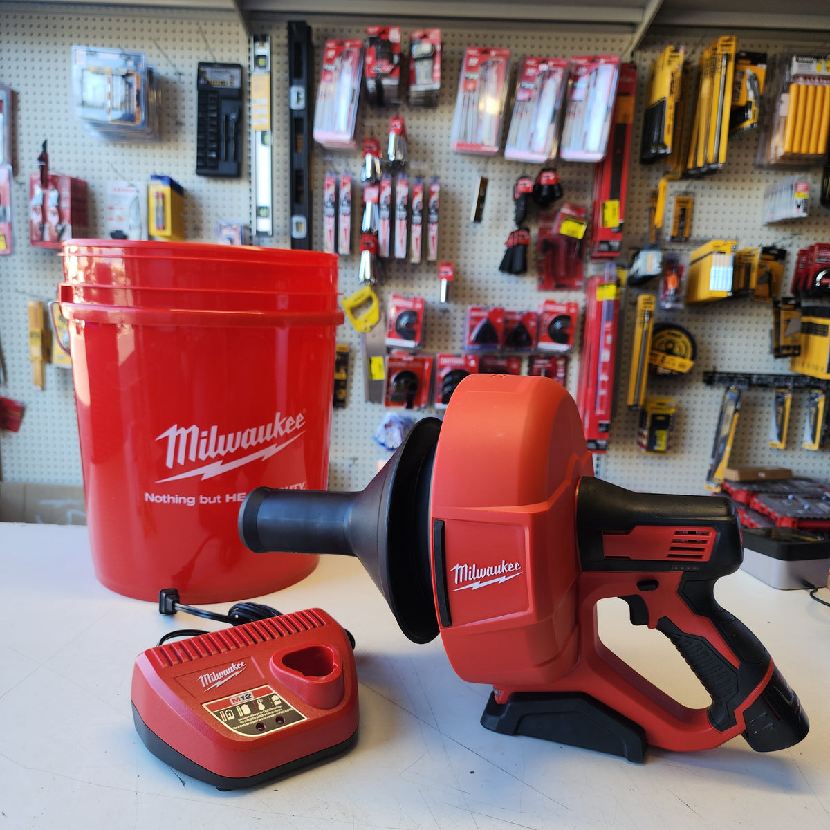 Milwaukee M12 12-V Lithium-Ion Cordless Drain Snake Auger with 1.5Ah Battery, 5/16 in. x 25 ft. Cable, Charger, and 5 Gal. Bucket Milwaukee