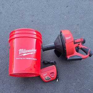 Milwaukee 2571-21 M12 12-V Lithium-Ion Cordless Drain Snake Auger with 1.5Ah Battery, 5/16 in. x 25 ft. Cable, Charger, and 5 Gal. Bucket - Used