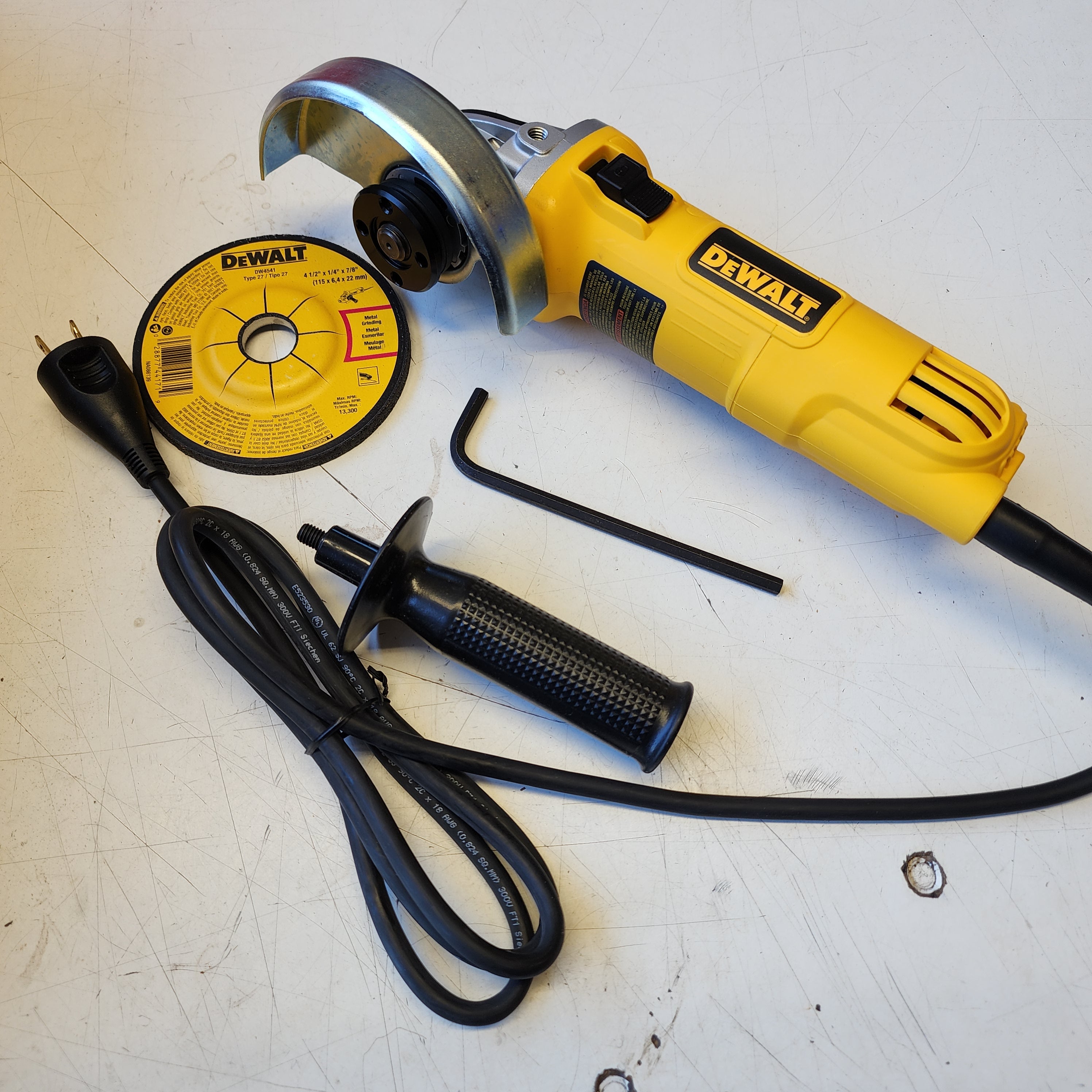 DEWALT DWE4011 4.5 in angle grinder for cutting grinding and polishing