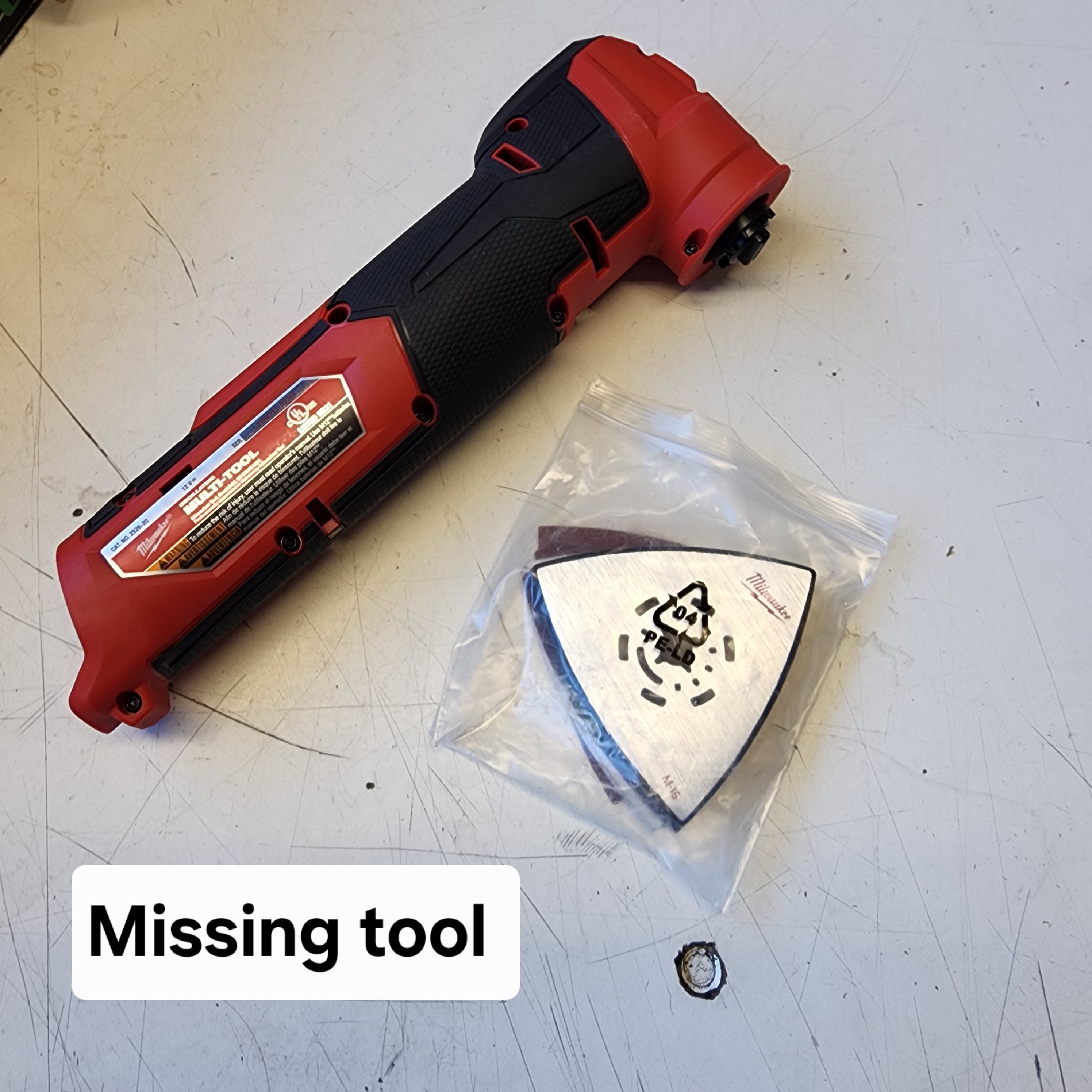compact Milwaukee cordless multi-tool close up view