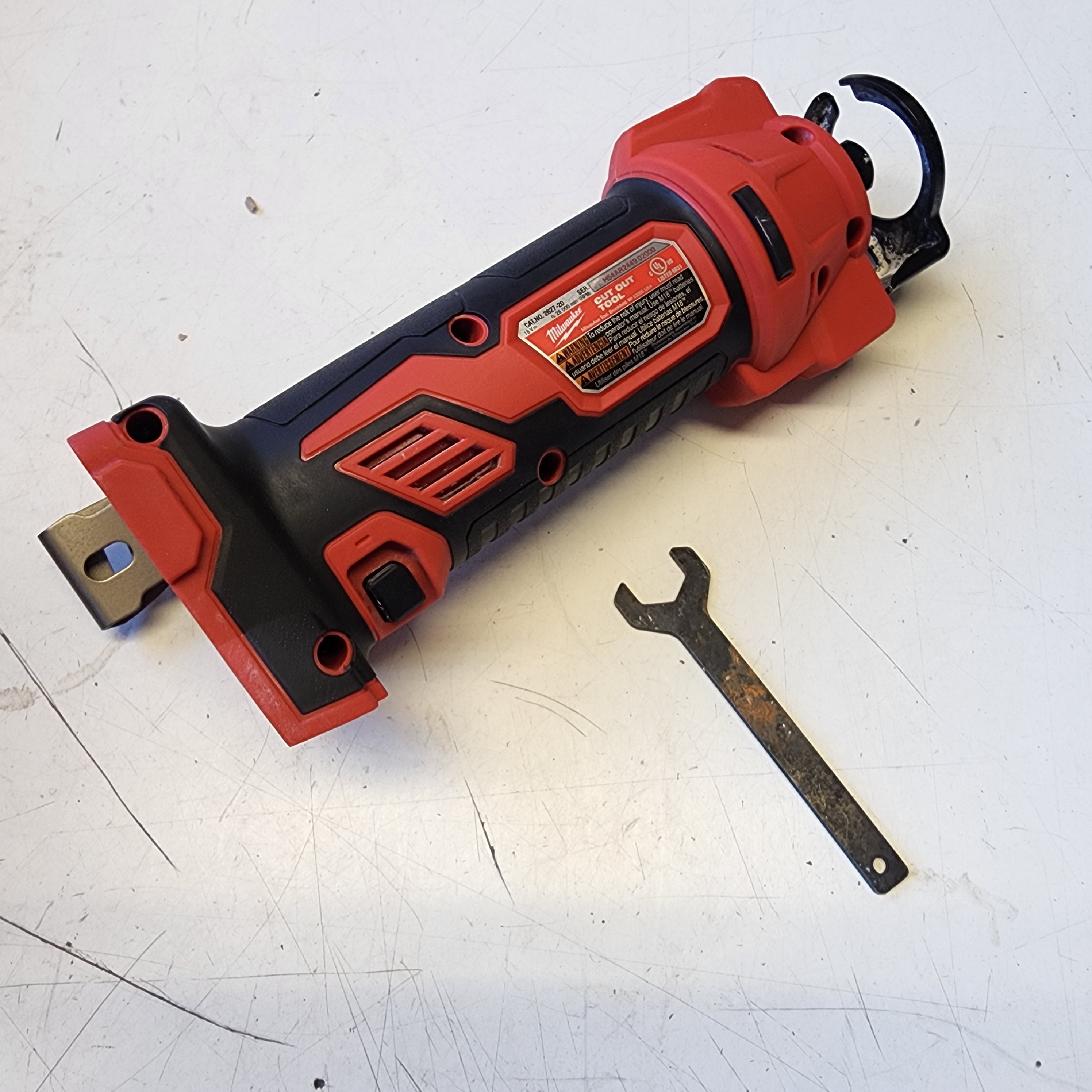 cordless Milwaukee drywall cutter close up view