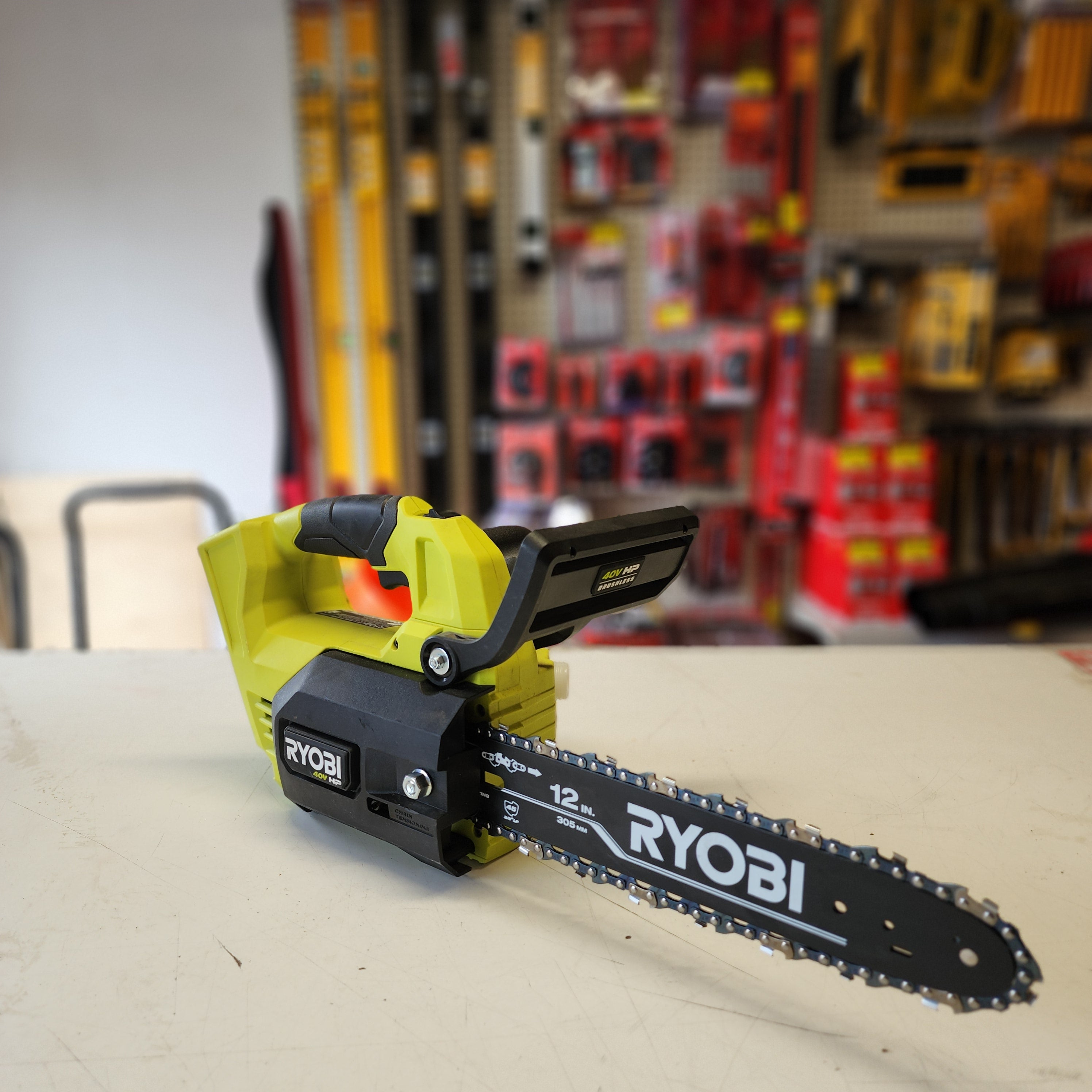 Ryobi battery powered chainsaw lightweight portable design
