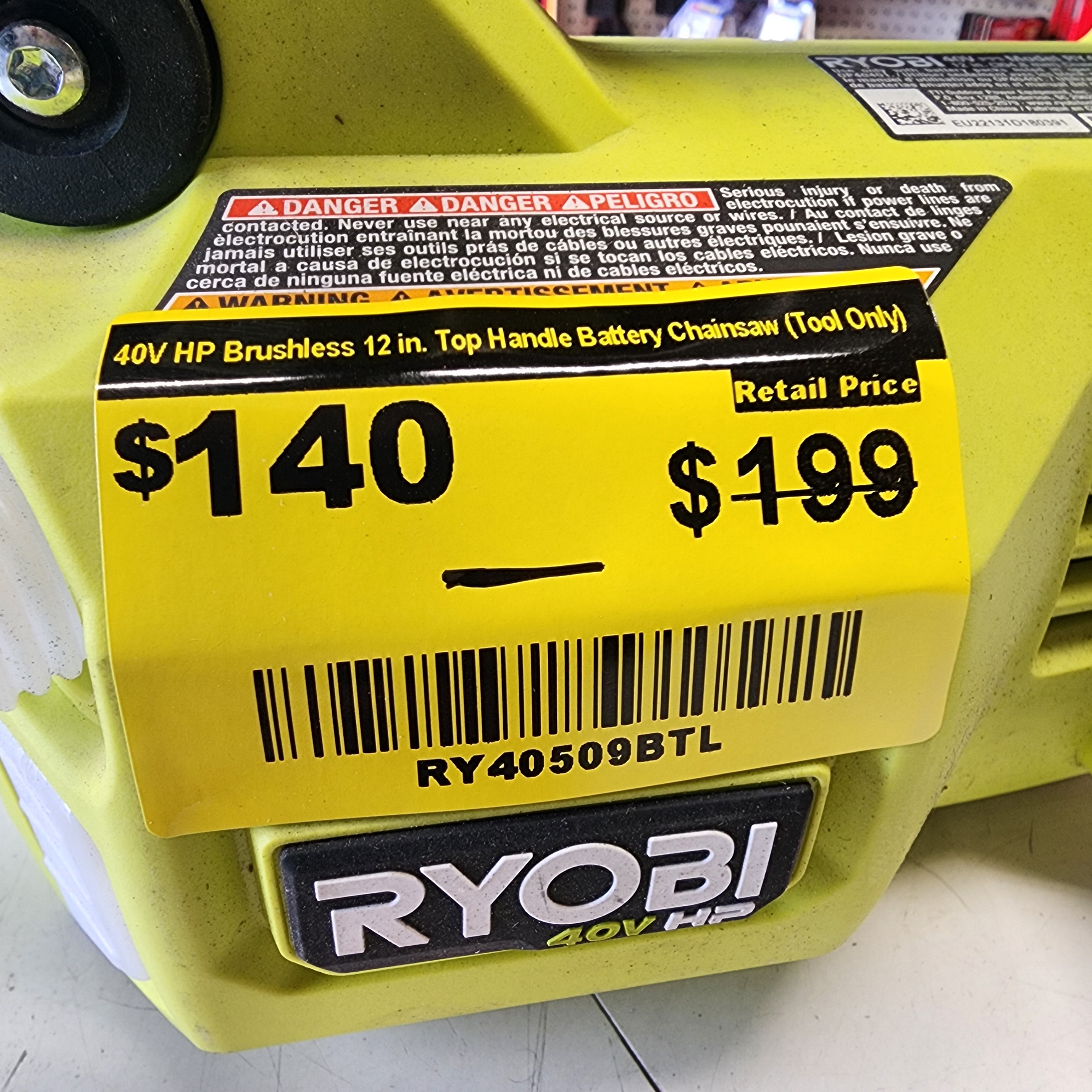 compact top handle chainsaw Ryobi 40V yard maintenance tool