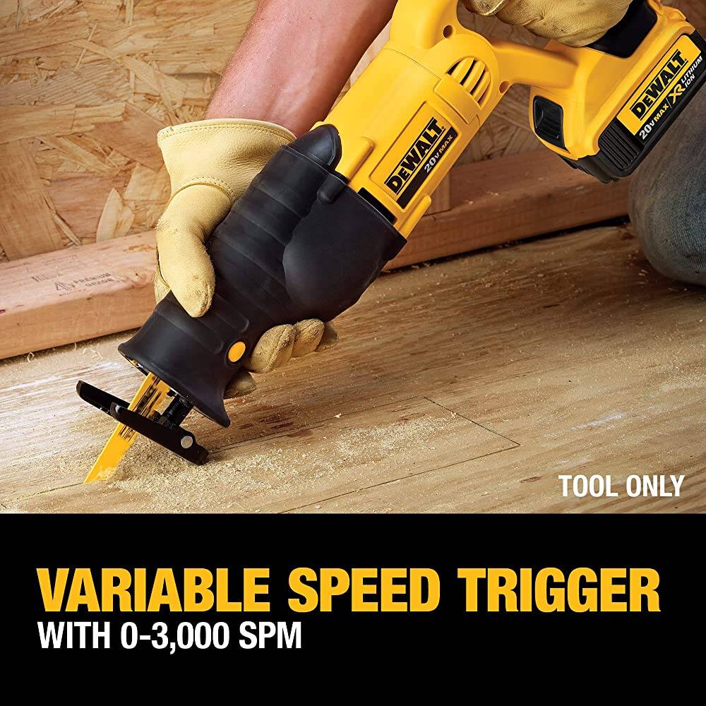 DEWALT DCS380B demo saw cutting nail-embedded lumber on construction site