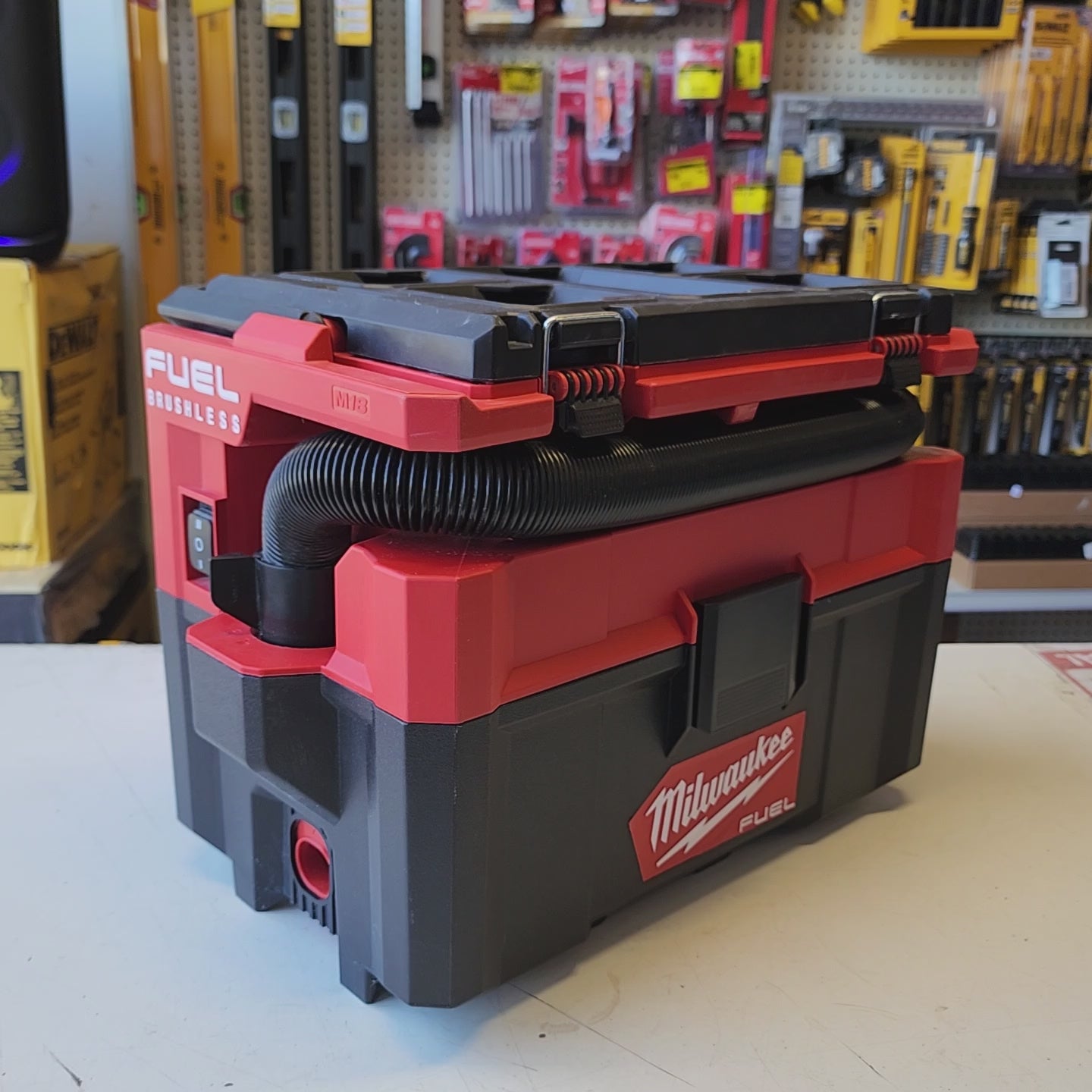 portable Milwaukee PACKOUT vacuum for mobile cleanup
